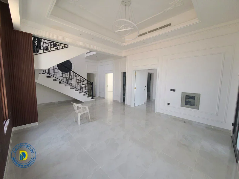 For sale, a modern villa with 5 rooms, including registration fees, Al Helio 2 area, Ajman, super deluxe finishing, freehold, bank financing63907700861314114