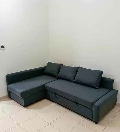 Ikea L Shape Sofa cum bed with big storage in L