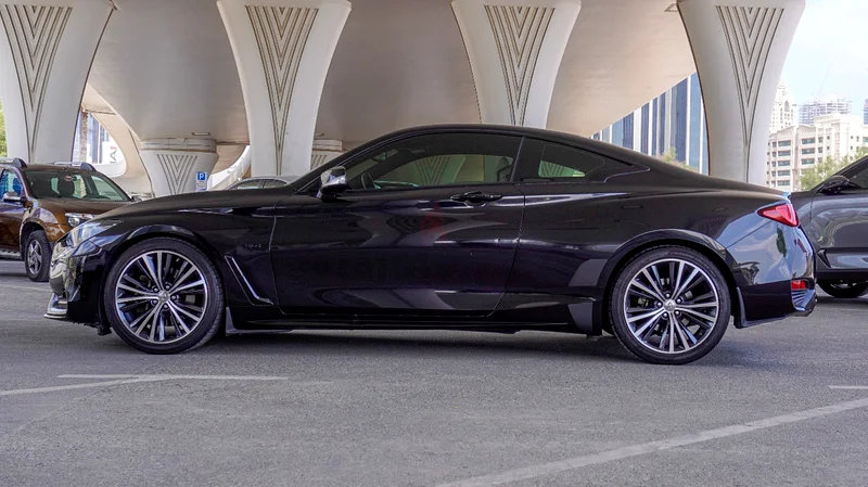 إنفينيتي Q60 3.0t بريميوم كوبيه – أسود جيت/جلد بيج، 80,000 كم، خدمة كاملة63613736416513112