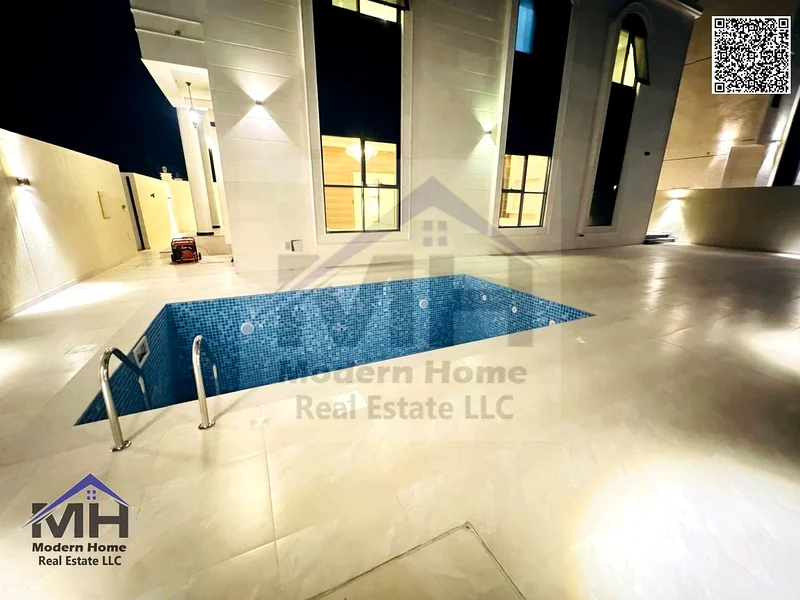 At an all-inclusive price, own a corner villa with a swimming pool in Ajman. First resident, freehold, super deluxe finishing, opposite Azha Community63907479605890113