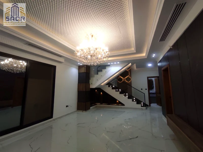 Luxury modern villa for sale in Al Helio 2 / Ajman, high-end and private location / three-story design / roof63911404074114114