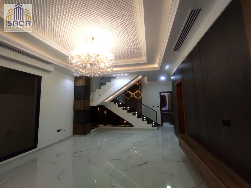Luxury modern villa for sale in Al Helio 2 / Ajman, high-end and private location / three-story design / roof63911404074114113