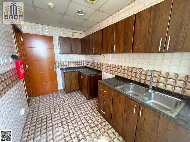Spacious 1BHK with Balcony & 2 Baths in Al Rawda 163721988153603111