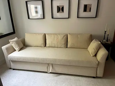 IKEA Holmsund three seat sofa bed under storage