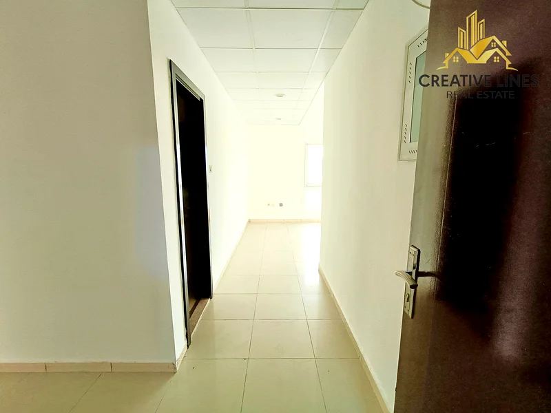 شقة مكونة من غرفتي نوم مع صالة وشرفة بالقرب من حديقة البركة، متاحة للعائلة63757570086787112