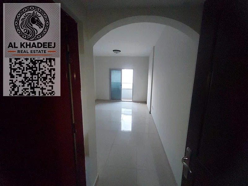 Two rooms and a hall with a large area and a balcony with a view in Al Jurf 2 area, next to all services, easy access to Dubai and Sharjah63715024915715110