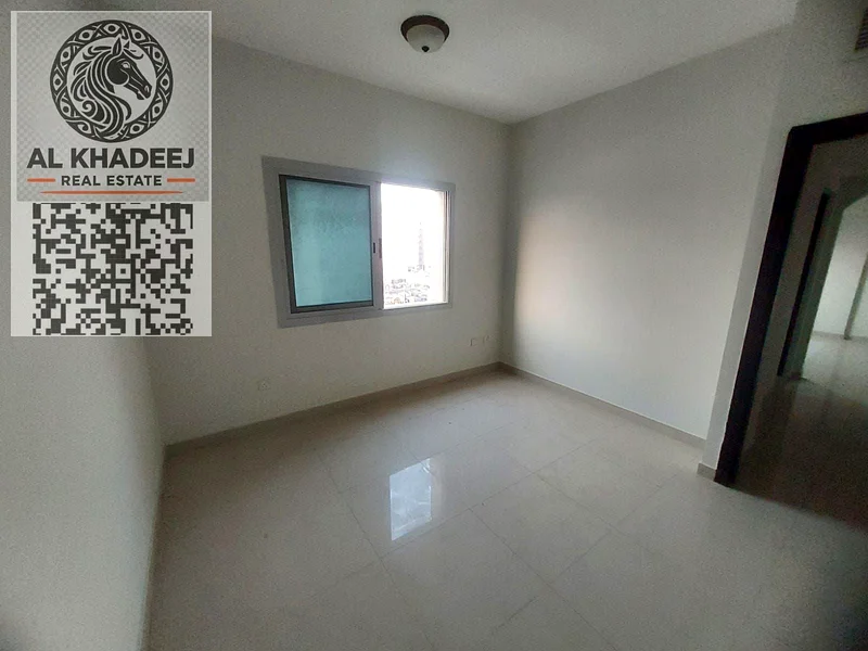 Two rooms and a hall with a large area and a balcony with a view in Al Jurf 2 area, next to all services, easy access to Dubai and Sharjah63715024915715111