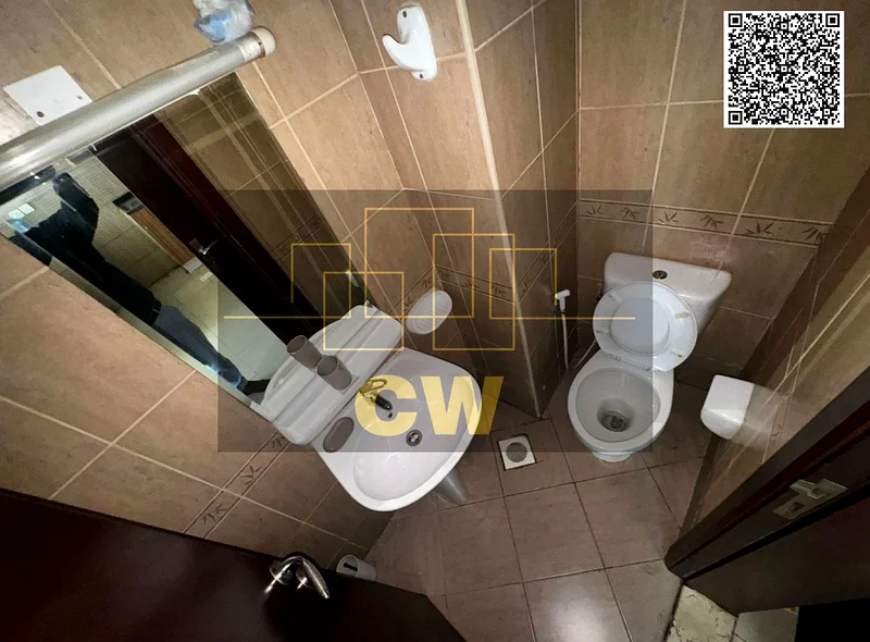 شقة من غرفة نوم واحدة للبيع بسعر 350 ألف مع موقف سيارة63890797254787112