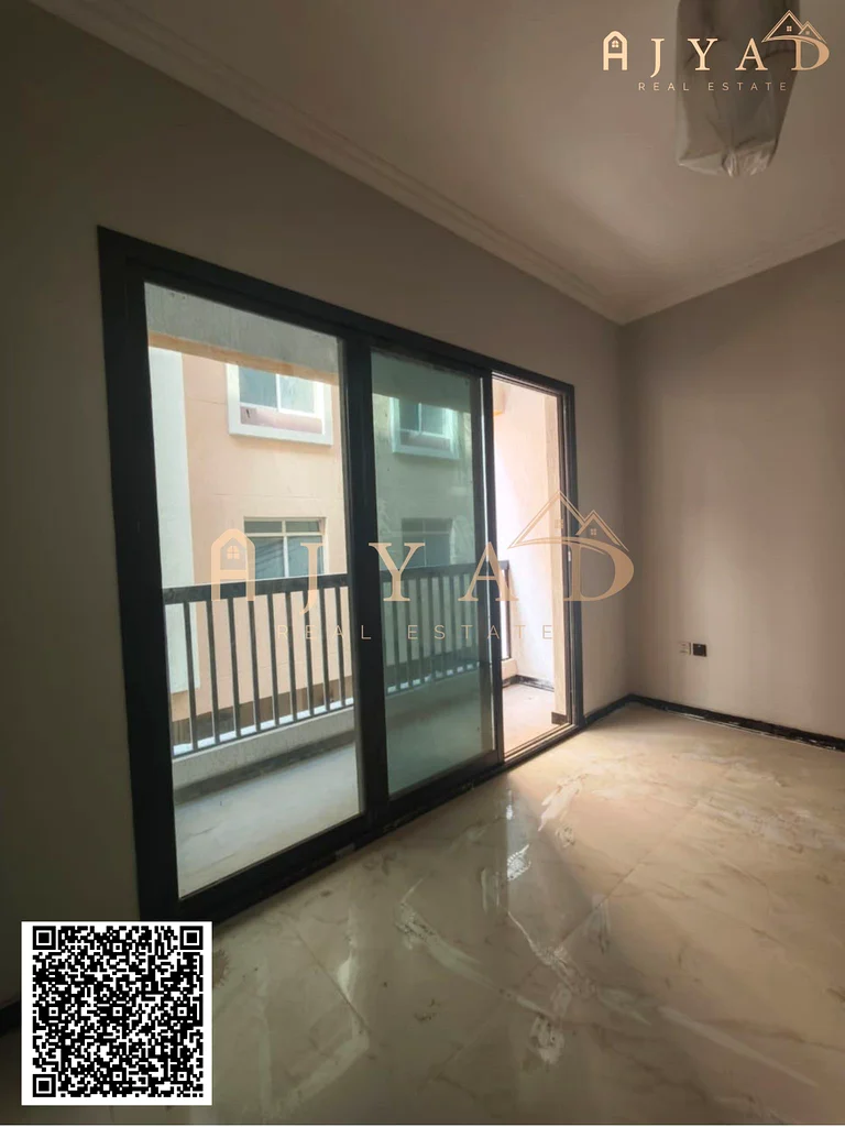 شقة واسعة مكونة من غرفتين نوم للإيجار في مويحات 3، عجمان63715397694210112