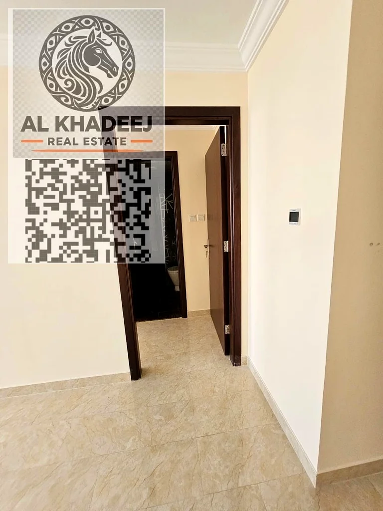 The finest two-room apartment with a balcony and an open view, Al Rawda 2 area, next to all services, easy access to Dubai and Sharjah63723652827139113