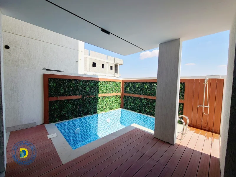 Modern villa with 5BR, with a pool and a roof, including water, electricity, AC and reg fees, ALBahia,super deluxe finishing, freehold, bank financing63882680759810113