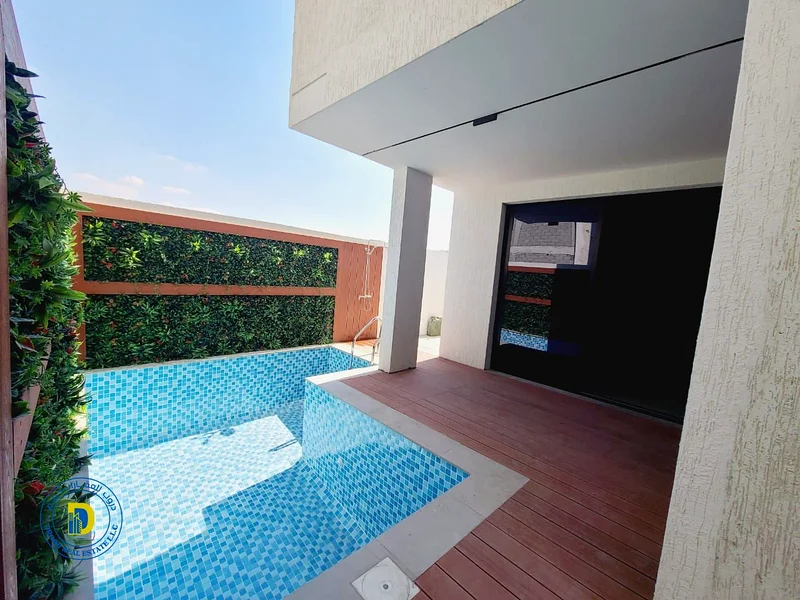 Modern villa with 5BR, with a pool and a roof, including water, electricity, AC and reg fees, ALBahia,super deluxe finishing, freehold, bank financing63882680759810112