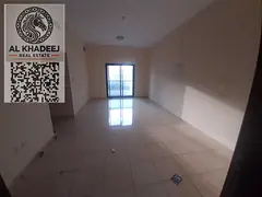Premium apartment for annual rent in Ajman Rashidiya 1, 2BR + hall with balcony and 3 baths, prime l
