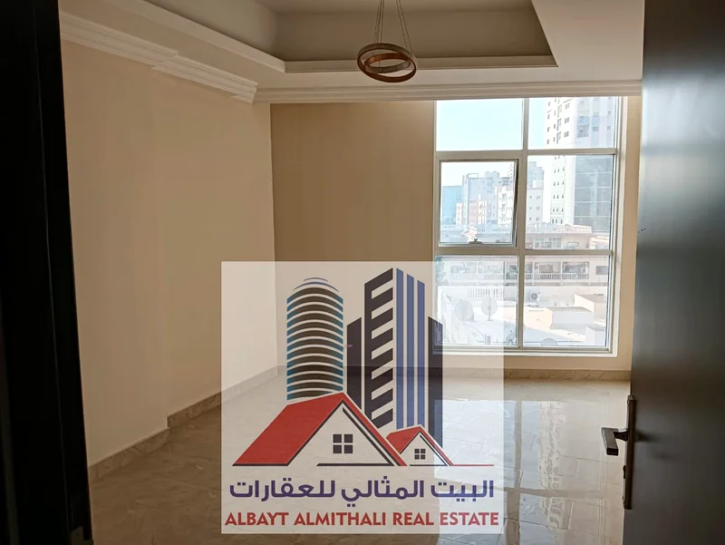 شقة مكونة من غرفتي نوم للإيجار – الروضة 2 بسعر 47,000 درهم مع شهر مجاني ووقوف سيارات مجاني63722901778435111