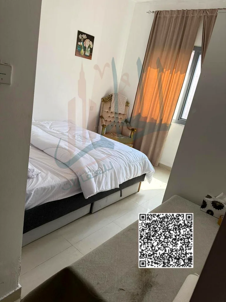 Furnished apartment for resale in Al Nuaimiya Tower 1 with a payment plan. Prime location and nearby services.63887401651714111