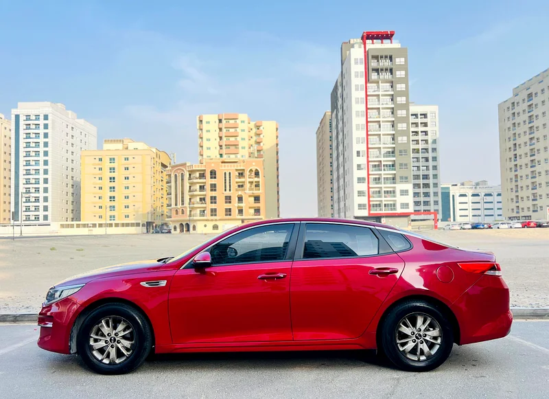 KIA OPTIMA 2017 MODEL RED GCC SPECS LESS KM REF.747763612056039810112
