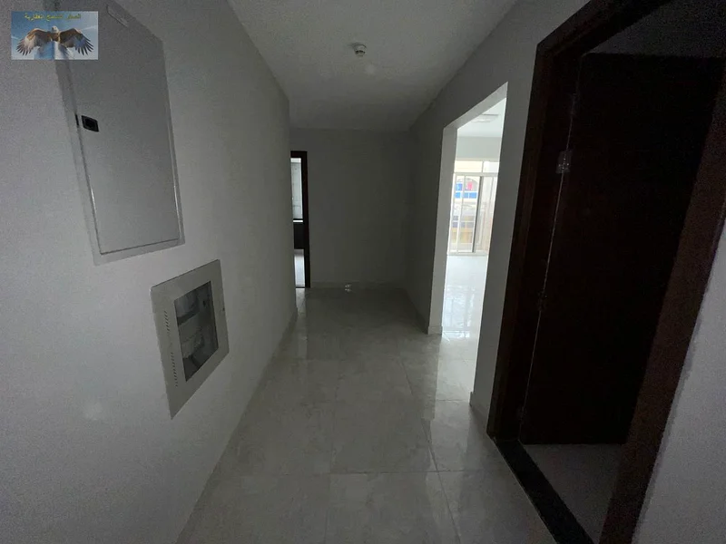 One-bedroom apartment for annual rent in a modern building in Al Rawda 3, featuring a modern design, elegant finishing, and central air conditioning f63719242945282111