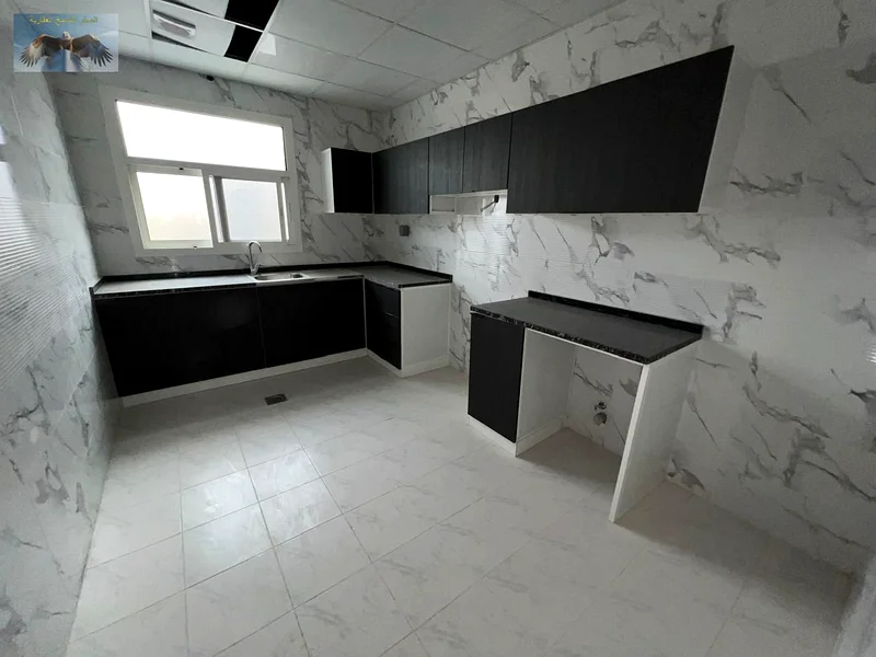 One-bedroom apartment for annual rent in a modern building in Al Rawda 3, featuring a modern design, elegant finishing, and central air conditioning f63719242945282113
