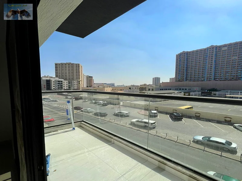 First tenant, two rooms and a hall with a balcony overlooking the main street, a large area for annual rent in Al Rawda 3 in Ajman63723377450883113