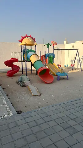 Colorful Outdoor Playset with Slides and Swings - Perfect for Kids!