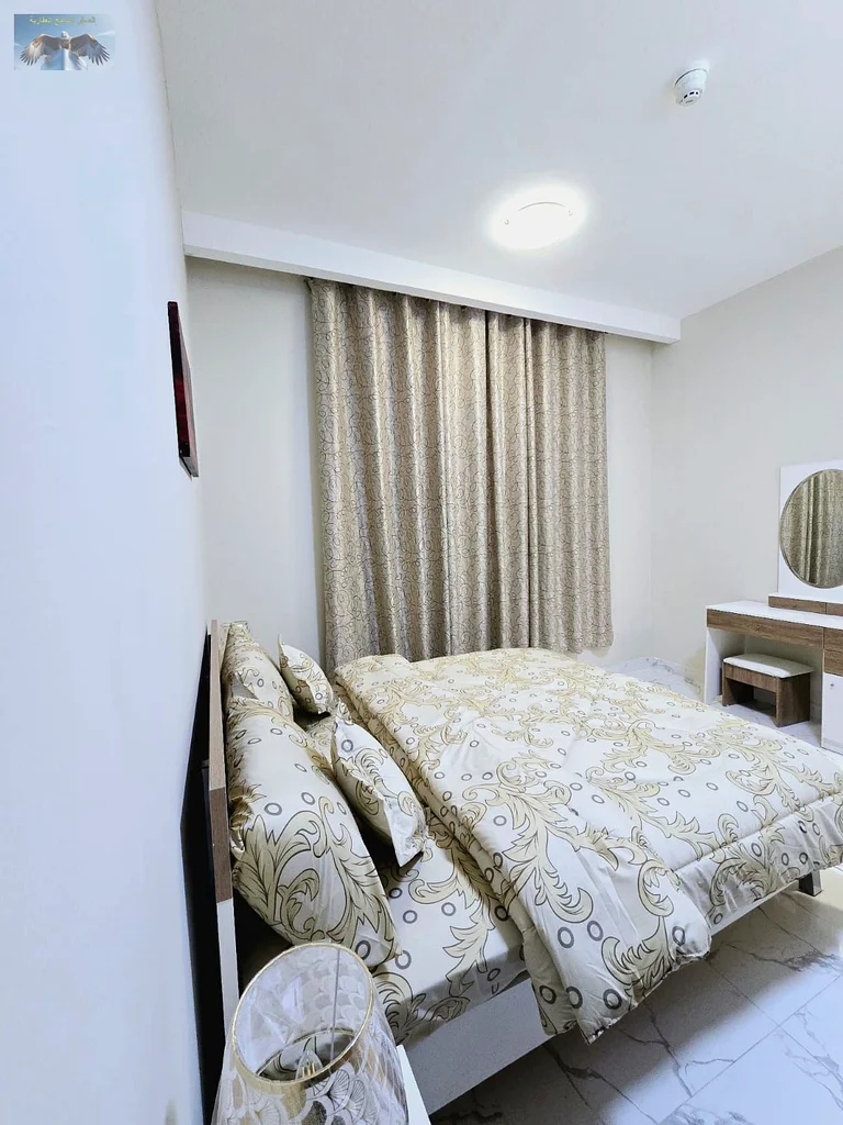 For sale in Ajman: 3BR Hall + store in Oasis Tower 2 | Sea view, gym, pool, parking | Spacious unit with furniture | Direct view of Ajman Creek | Great63890250478339112