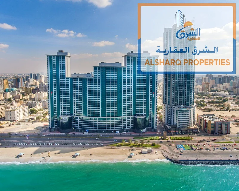 Rent a luxurious two-bedroom apartment with a gym, parking, and a swimming pool with a direct view of the Ajman Sea63810632290179110