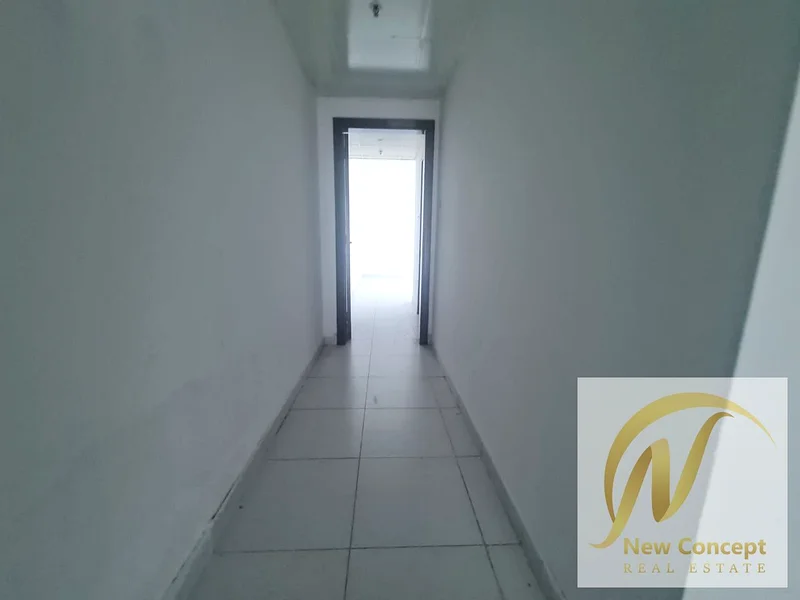 Two rooms, a hall, Al Rashidiya, a balcony, free parking, and a special price63720775321347114