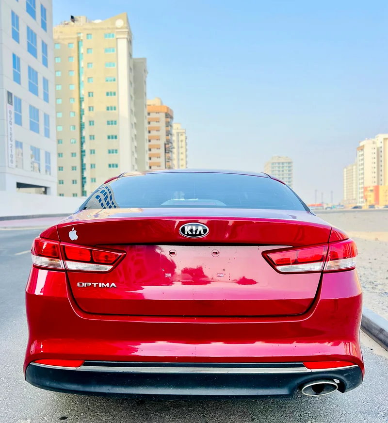 KIA OPTIMA 2017 MODEL RED GCC SPECS LESS KM REF.747763612056039810111