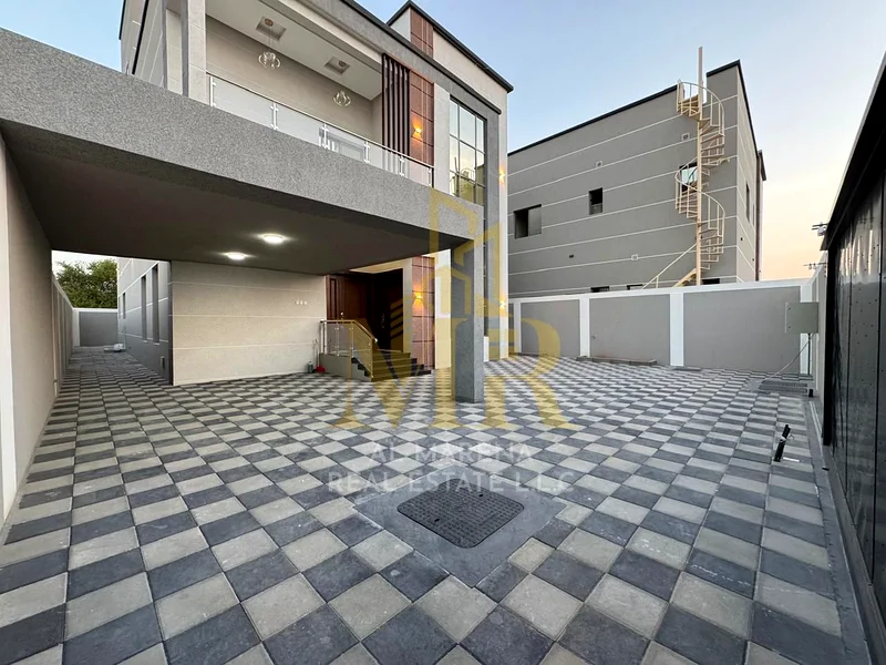 🏡 For Sale – Luxury Villa in Al Rawda 2 – Ajman | Prime Location on Sheikh Ammar Street | 2 Floors + Roof | 5 Master Bedrooms with Built-in Wardrobes63878605090177111