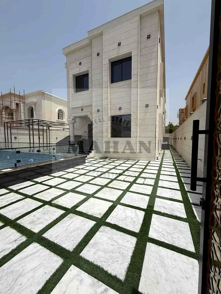 فيلا للبيع 5 غرف نوم وصالة ومجليس الف روضة عجمان63878505872258113