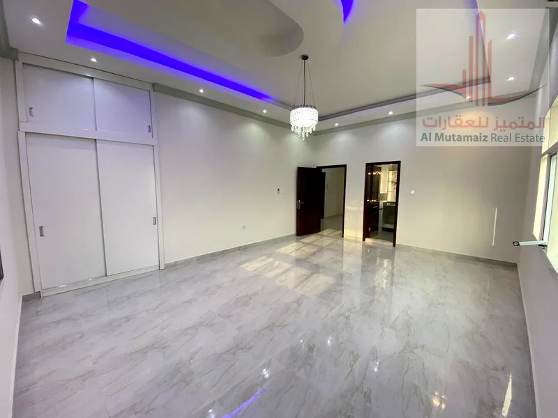 Experience elevated living in  this beautifully designed 5-bedroom+ Hall + majlis ..villa located in the sought-after neighborhood of mowaihat 363870241166595111