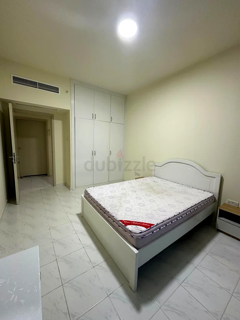 Furnished master room available for single lady next to Emirates tower metro @ 4000with dewa and net63795843962115114