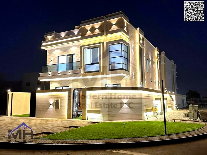 At a price including fees, own a corner villa in Ajman for sale, first inhabitant, freehold, central AC close to services and opposite Azha Community63906645194371110
