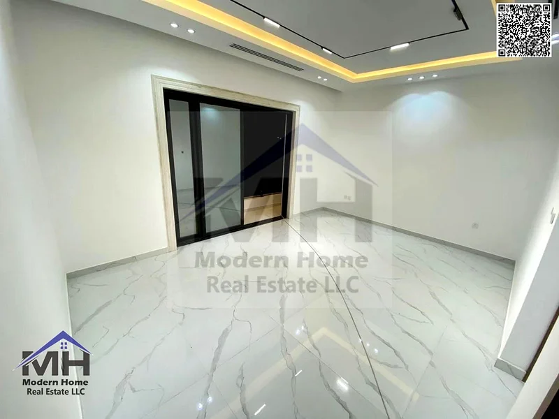 At a price including fees, own a corner villa in Ajman for sale, first inhabitant, freehold, central AC close to services and opposite Azha Community63906645194371113
