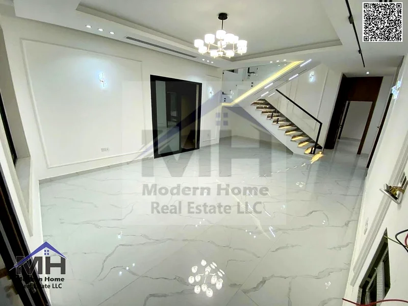 At a price including fees, own a corner villa in Ajman for sale, first inhabitant, freehold, central AC close to services and opposite Azha Community63906645194371114