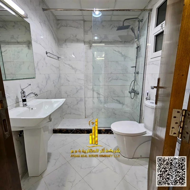 Luxurious two-bedroom apartment with a living room, open view, newly furnished, for monthly rent in Ajman - Al Rashidiya 1 - Oasis Towers63852458151043114