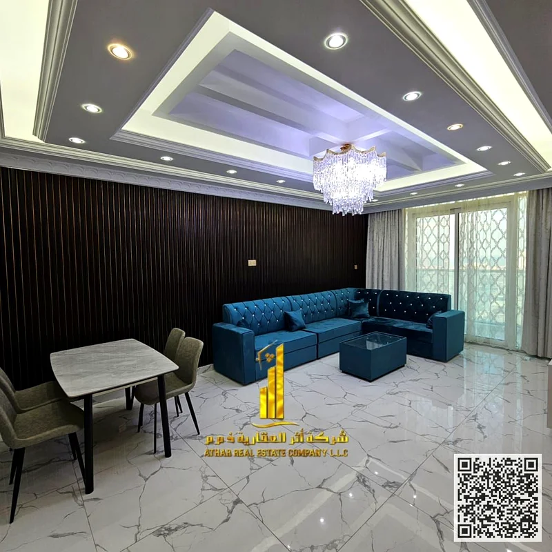 Luxurious two-bedroom apartment with a living room, open view, newly furnished, for monthly rent in Ajman - Al Rashidiya 1 - Oasis Towers63852458151043112