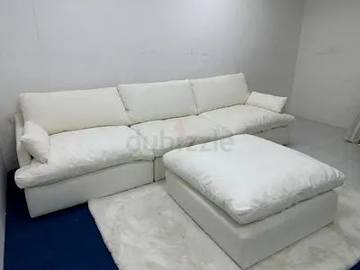 White color modular sofa with footstool