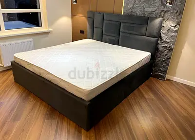 Stylish and Comfortable Bed with Modern Headboard