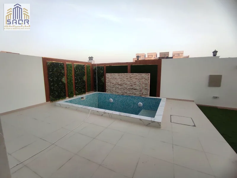 فيلا ببركة سباحة، وبسعر يشمل رسوم التسجيل ورسوم الملكية، على الشارع الرئيسي / في أكثر مناطق عجمان رقيًا، ملكية حرة63911618961923114