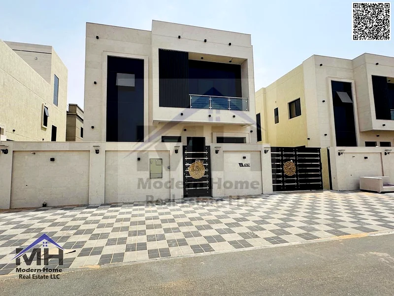 Without annual fees, own a modern villa in Ajman, freehold, first inhabitant, super deluxe finishing, next to services, opposite Azha Community63906645205249111