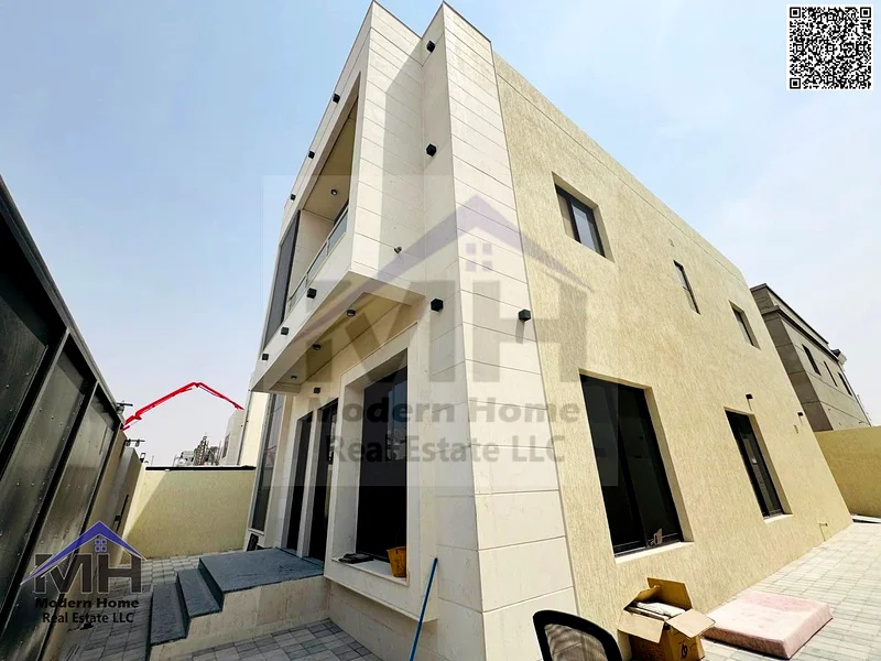 Without annual fees, own a modern villa in Ajman, freehold, first inhabitant, super deluxe finishing, next to services, opposite Azha Community63906645205249112
