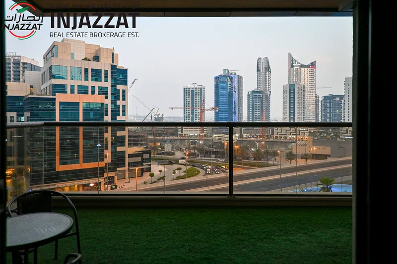 2BR Apartment | Corner Unit with Full-Length Balcony and Canal Views | Elite Downtown Residence63770726330114112