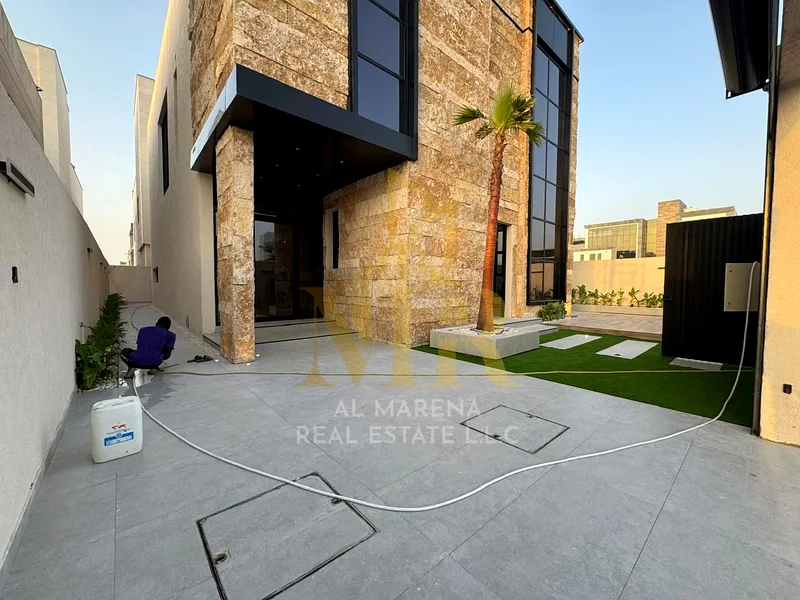 🏡 للبيع: فيلا فاخرة في الحليّا – عجمان | طابقين | تصميم حديث | 5 غرف نوم رئيسية | مجلس + قاعتي جلوس عائلية | مطبخ عصري | منطقة جلوس خارجية63872298201089112
