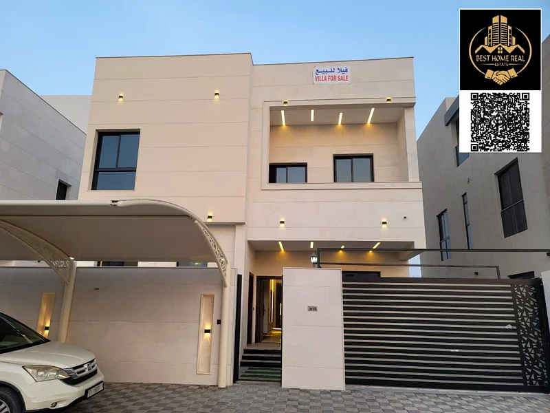For Sale – Villa in Al Bahia – Ajman | 2 Floors + Roof | 6 Master Bedrooms | Majlis + 2 Living Rooms | Main Kitchen + Preparatory Kitchen | Elegant63883087845122110