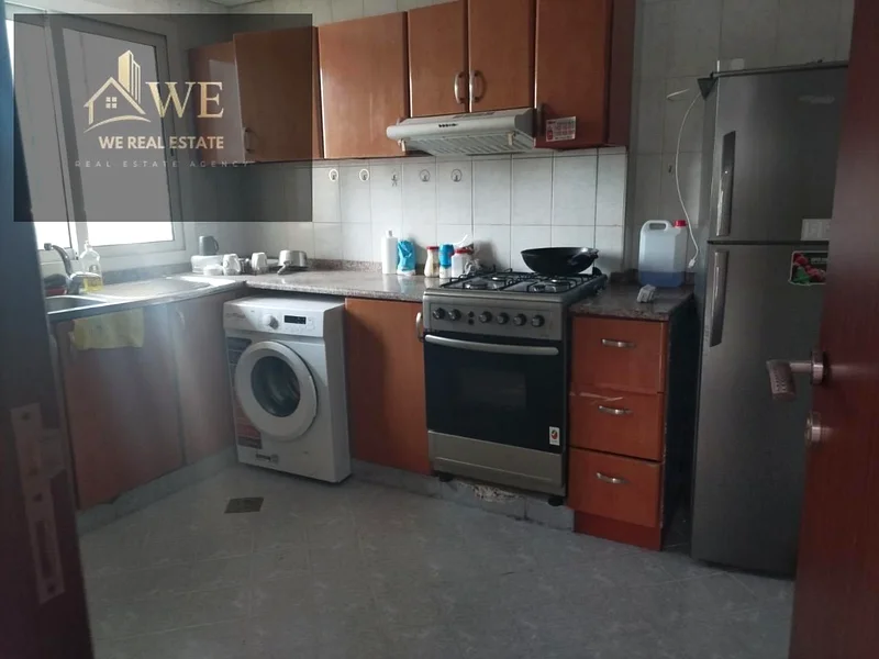 1 BHK apartment for sale in Ajman – Orient Tower – Tower A2, featuring a spacious area of 984 sqft and a stunning full garden view that offers a peace63867462941057111