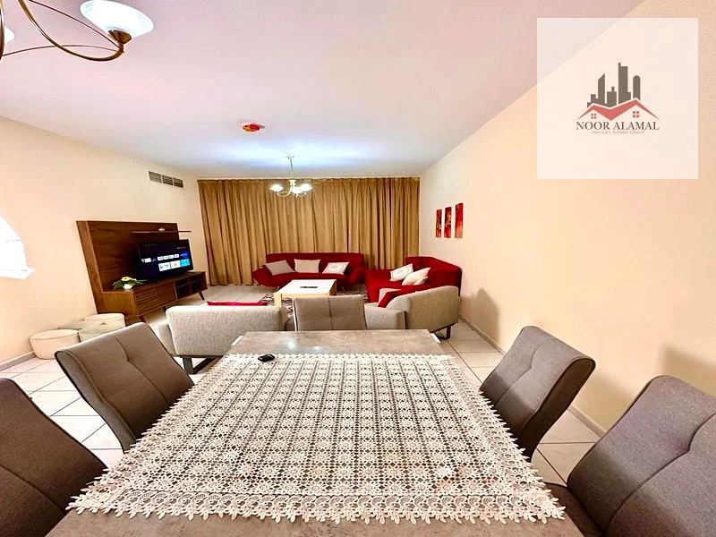 Sharjah Al Qasba, two rooms, a hall, a kitchen with all the necessities, two bathrooms, and a balcony. The price is 5,900, including all bills.63827872127106112