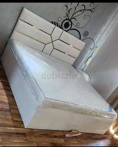 Elegant White Queen size Bed with Stylish Headboard