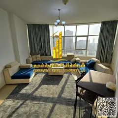 Luxury apartment, one bedroom, hall, open view, newly furnished, with parking, for rent in Ajman - A