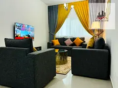 Sharjah Al Taawun, two rooms, a hall, a kitchen, two bathrooms, and a balcony with a view. The price